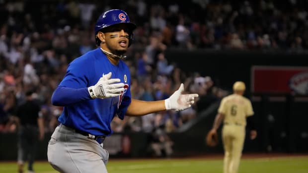 Sep 15, 2023; Phoenix, Arizona, USA; Chicago Cubs second baseman Christopher Morel (5) reacts after hitting a solo home run against the Arizona Diamondbacks in the ninth inning at Chase Field. Mandatory Credit: Rick Scuteri-USA TODAY Sports  